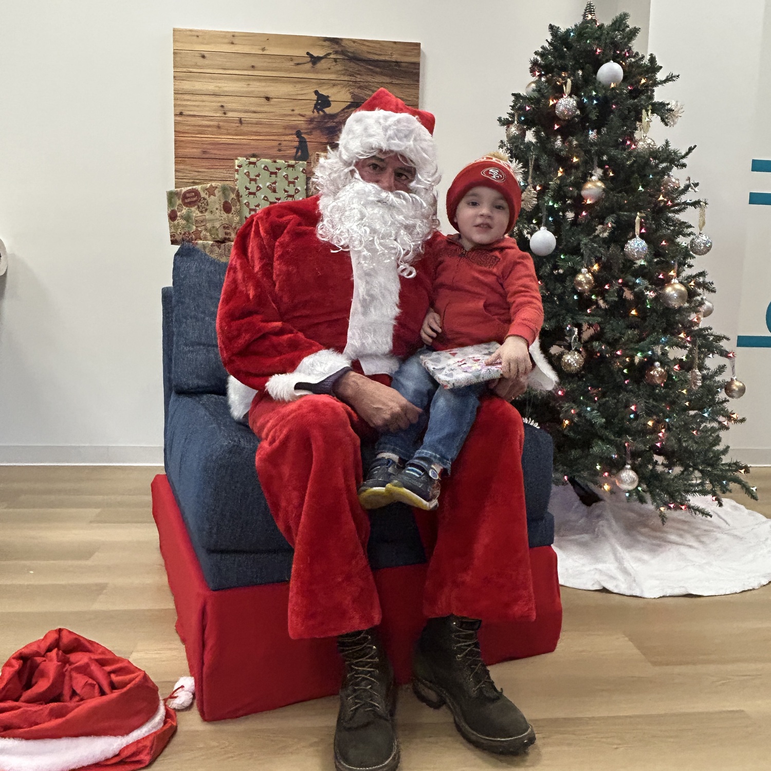 Santa made a visit to the Flying Point Foundation For Autism's The Point in Southampton on Sunday where he listened to the wish lists of special needs children and young adults. COURTESY FPF4AUTISM