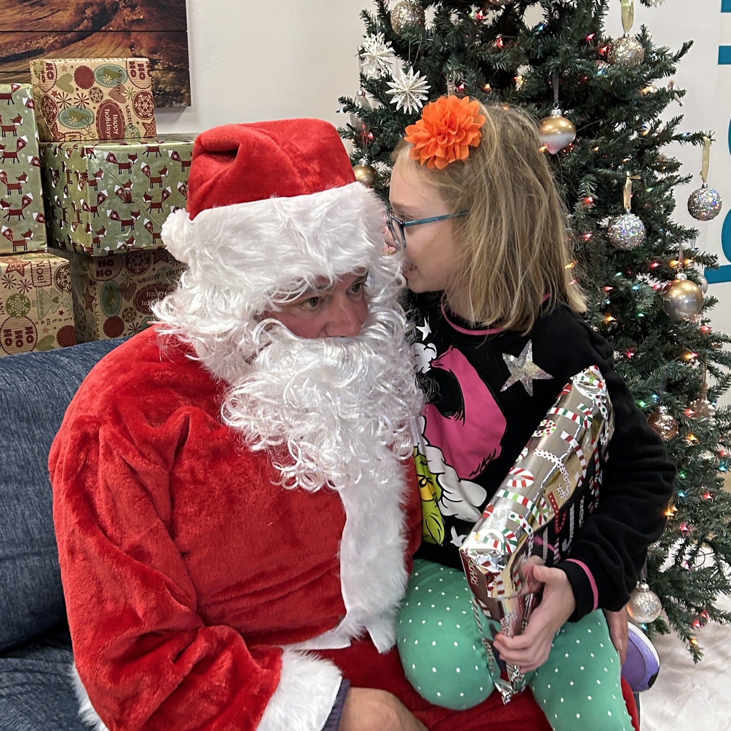 Santa made a visit to the Flying Point Foundation For Autism's The Point in Southampton on Sunday where he listened to the wish lists of special needs children and young adults. COURTESY FPF4AUTISM