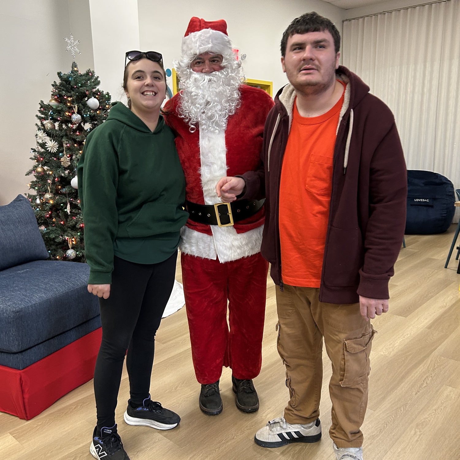 Santa made a visit to the Flying Point Foundation For Autism's The Point in Southampton on Sunday where he listened to the wish lists of special needs children and young adults. COURTESY FPF4AUTISM