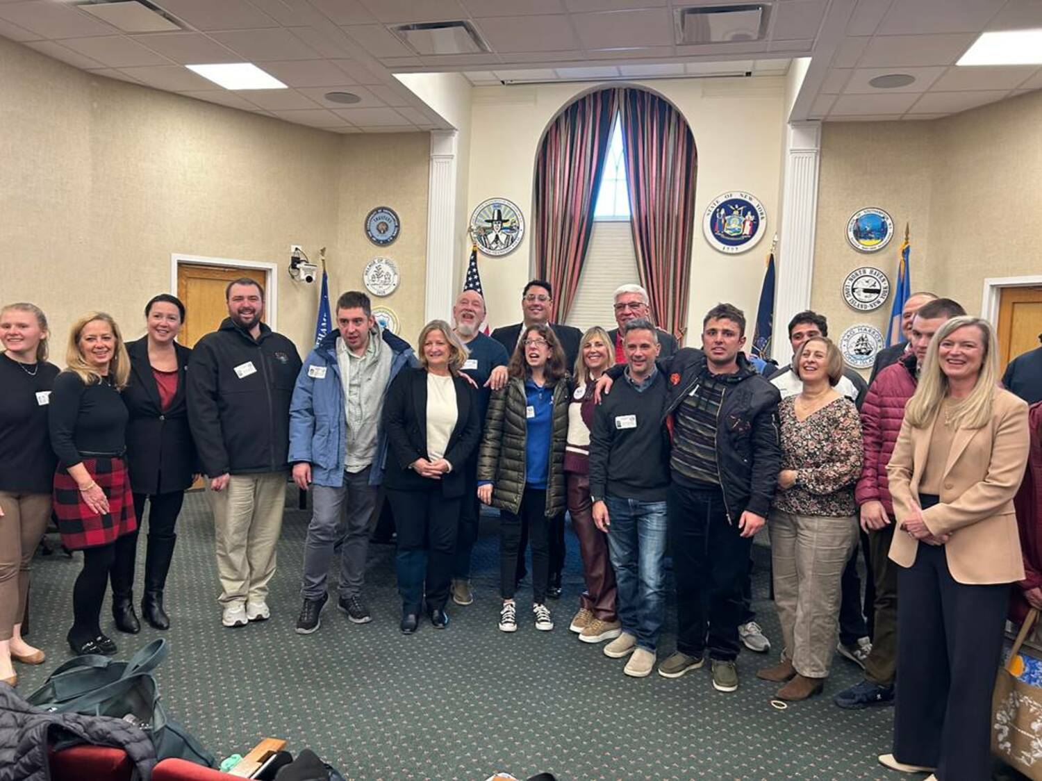 Dozens of residents of Luv Michael Homes and their families burst into applause when the Southampton Town Board approved a $630,000 grant on Tuesday night that will allow the non-profit to pay off the mortgage on a five-bedroom home on St. Andrews Road that will become the fourth home for autistic adults the group runs in Southampton. COURTESY SOUTHAMPTON TOWN