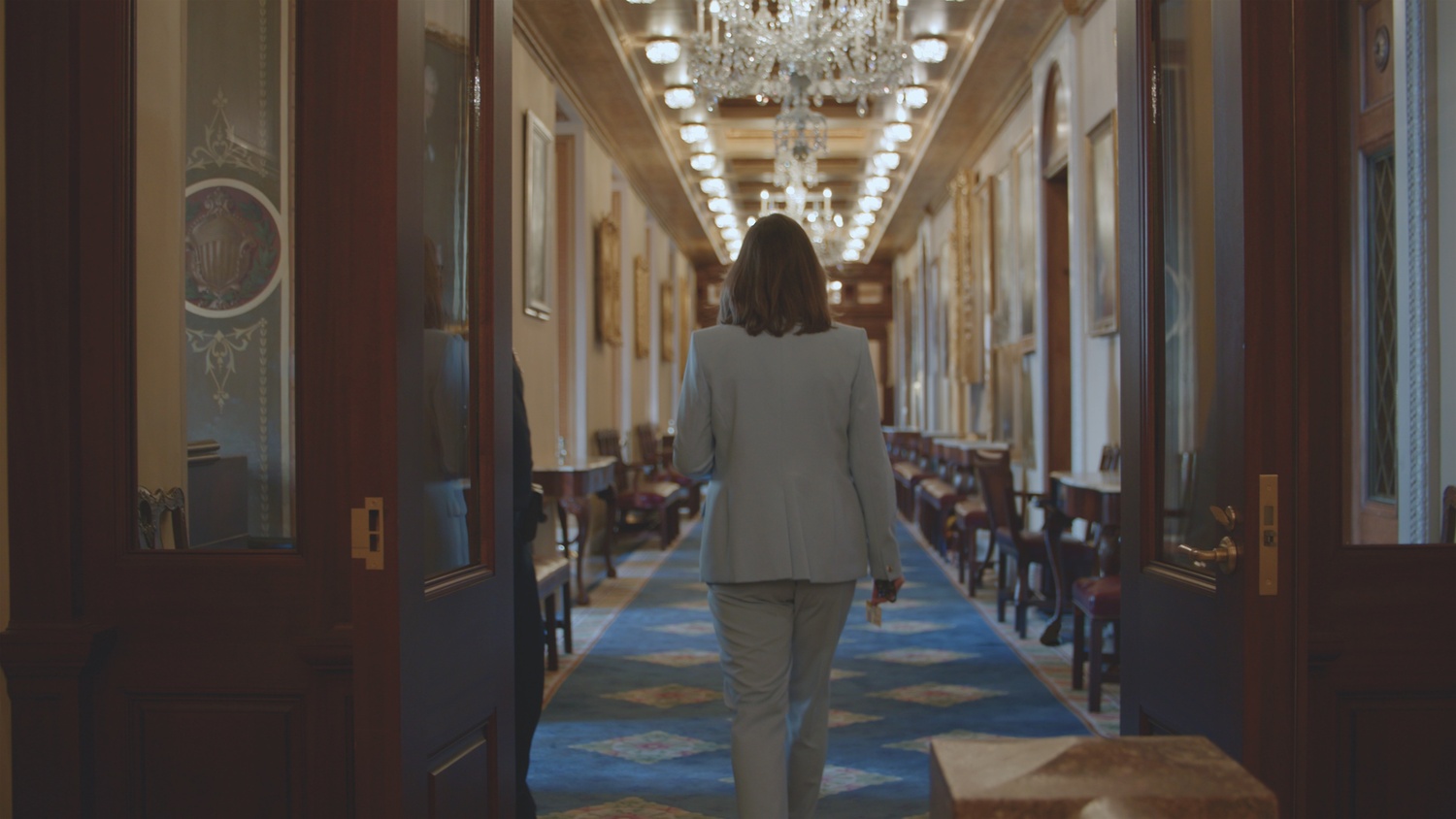 Newly elected Congresswoman Sarah McBride of Deleware walks the halls of the Capitol in Chase Joynt's documentary 'State of Firsts.' MELISSA LANGER
